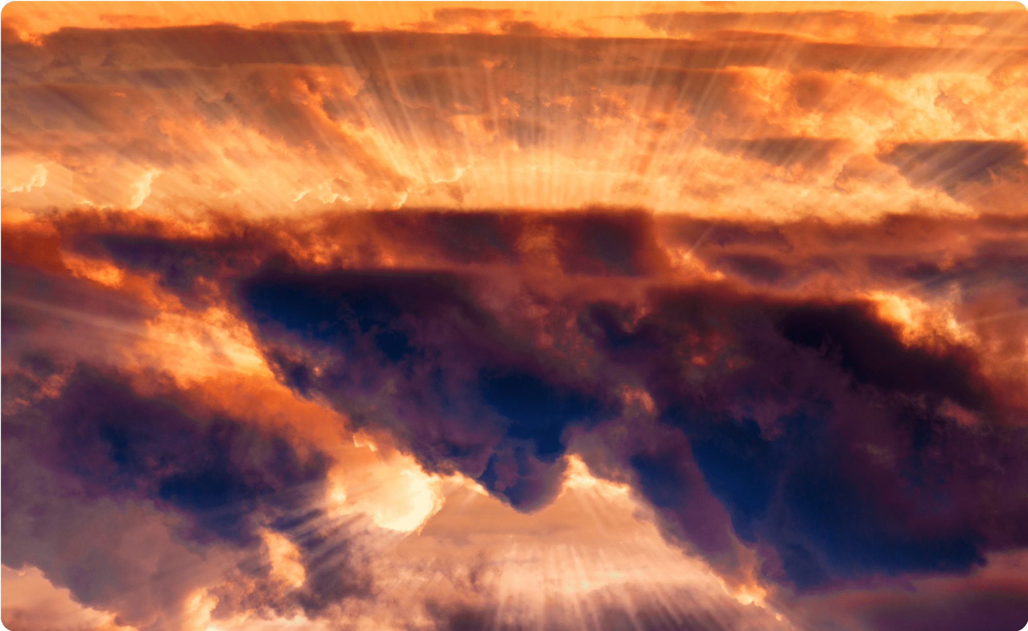 Vibrant sunset with dramatic clouds and sun rays illuminating the sky.