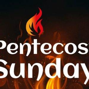 Pentecost Sunday celebration with flames and dark background