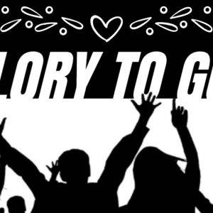 People raising their hands in worship under the “Glory to God” banner with decorative elements.