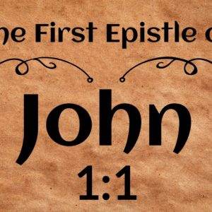 The First Epistle of John 1:1 written on parchment paper with ornate design