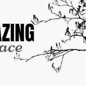 Silhouette of a tree branch with the text "Amazing Grace" in bold black and green letters.