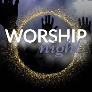 Worship night event with raised hands and glowing ring on dark background