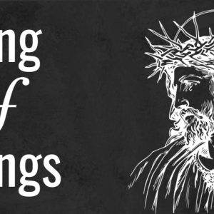 Artistic depiction of Jesus with the crown of thorns labeled King of Kings.