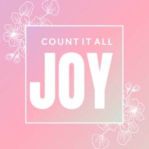 Pink gradient background with white text saying "Count It All Joy," featuring subtle floral designs and smiley faces.