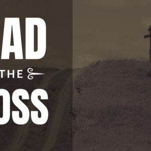 Road to the Cross sign with cross on a hill