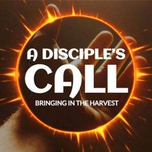 Hand holding a glowing ring with "A Disciple's Call Bringing in the Harvest" text