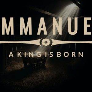 Emmanuel text with 'A King is Born' and a manger illuminated by a heavenly light