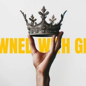 Hand holding a ornate crown with bold yellow text "Crowned with Glory" on a white background.