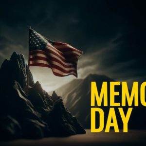 American flag waving on a mountain at night with bold "Memorial Day" text.