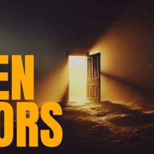 Illuminated doorway with "Open Doors" text against a mysterious backdrop