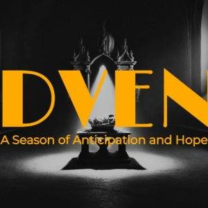 Advent, a season of anticipation and hope, highlighted with dramatic lighting in sacred space.