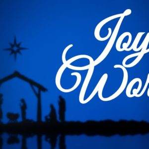 Nativity scene silhouette with "Joy to the World" text on a blue background.