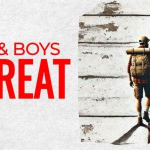 Men and Boys Retreat promotional image featuring a father and son hiking through a forest together.