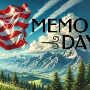 American flag waving over majestic mountains with "Memorial Day" text