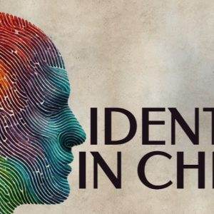 Colorful fingerprint face silhouette next to the text Identity in Christ on a textured background