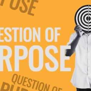 Person holding a target over face asking a question of purpose with question marks on orange backdrop.