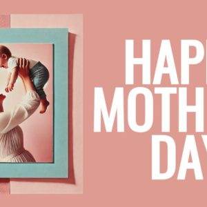 Mother lifting her baby, with Happy Mother's Day text in large white font on a pink background.