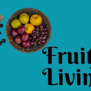 Colorful assortment of fresh fruits in a basket and on a board against a teal background with the text "Fruitful Living".