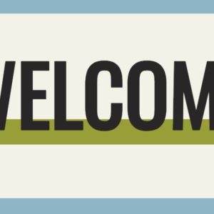 Bold "Welcome" sign with retro design elements and bright, inviting colors.