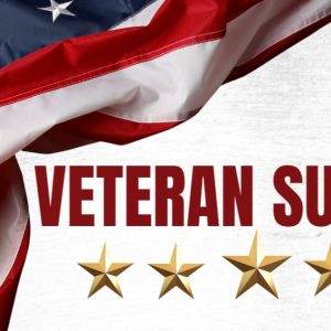 American flag with "Veteran Sunday" text and five gold stars