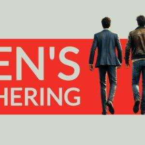 Three men walking toward a red banner reading "Men's Gathering"