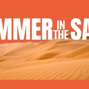 Orange desert sand dunes with bold white text reading 'Summer in the Sand'.