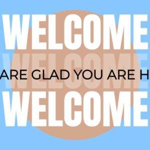 Welcome sign with 'We Are Glad You Are Here' in bold letters