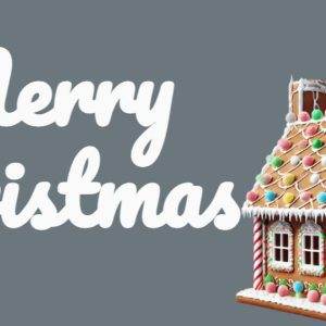 Festive gingerbread house with candy decor and the words 'Merry Christmas' in white script.