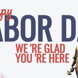 Happy Labor Day banner with tools and worker statues