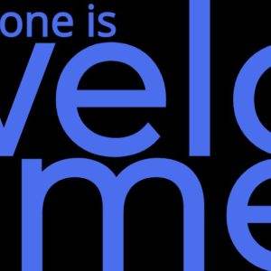 Bold text saying everyone is welcome in blue font on a black background