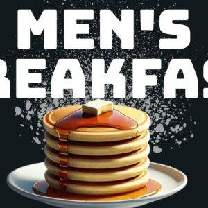 Stack of pancakes with syrup and butter on a plate, with text reading "Men's Breakfast"