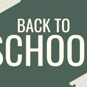 Back to School banner with lined paper on green background