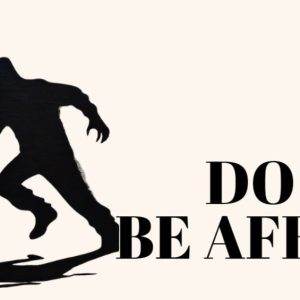 Silhouette of a monster chasing a man with the words "Do Not Be Afraid" beside them