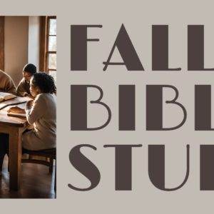 A group of people engaging in a fall Bible study session, seated around a table with open books in a sunlit room.