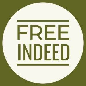 Circular emblem with the text 'Free Indeed' in bold lettering on an olive green background.