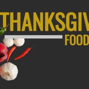 Colorful vegetables arranged beside the text "Thanksgiving Food Drive" on a dark background.