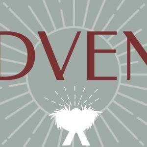 Advent sign with stylized sunburst and manger illustration on a muted green background.