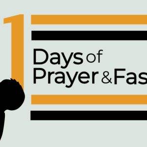 Silhouette praying beside text: 21 Days of Prayer & Fasting with black and orange accents.